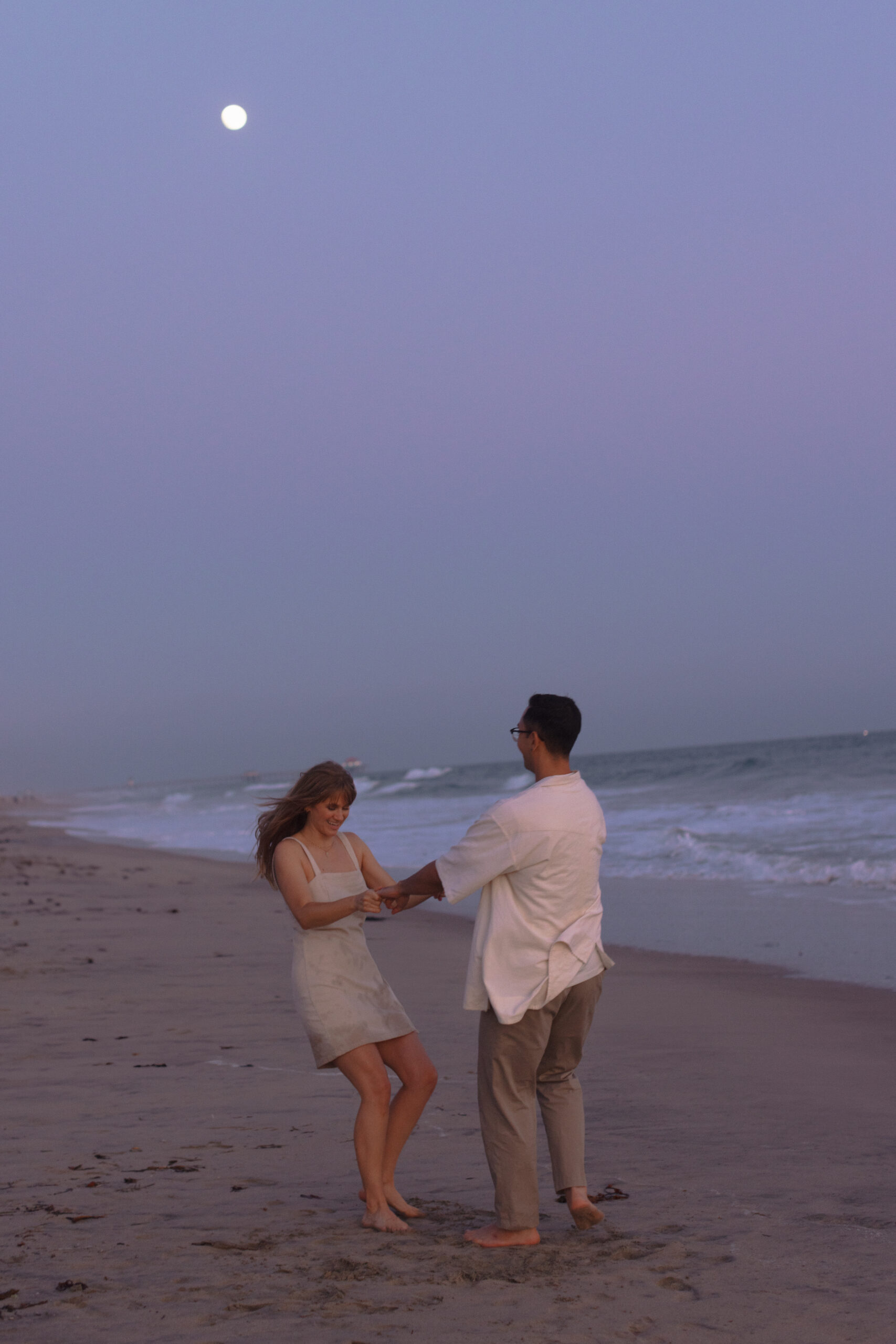 Intimate Sunset and full moon love story photoshoot at the beach in SoCal